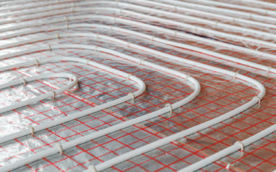 Underfloor heating installation. Close up on water floor heating system interior. plumbing pipes. Individual Heating.